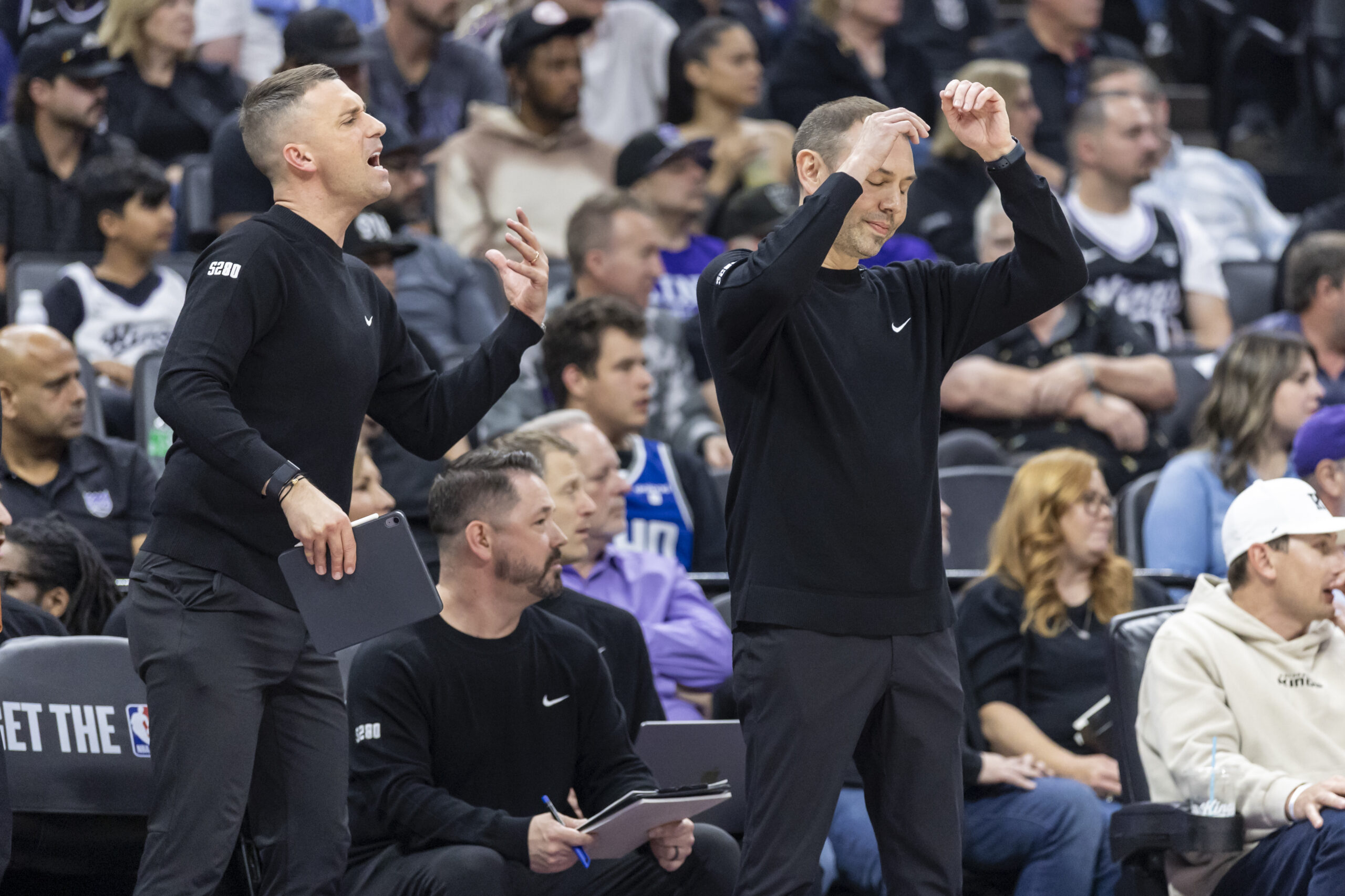 Denver Nuggets Head Coach David Adelman, right, reacts after Sacramento Kings score during the first half of an NBA basketball game Wednesday, April 9, 2025, in Sacramento, California.